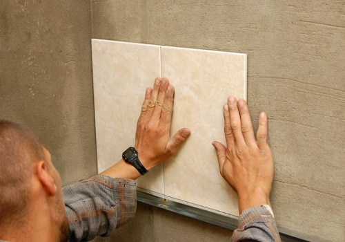 Укладка плитки на стену